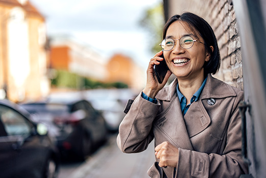 $name Women on the street talking on cell phone