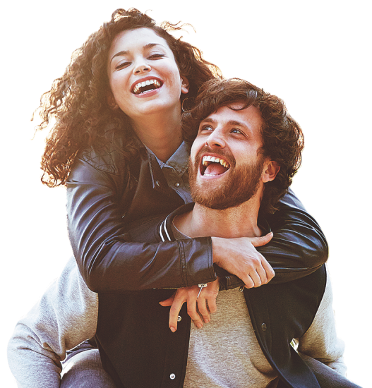 Medicaid Hero Woman on mans shoulders smiling and laughing