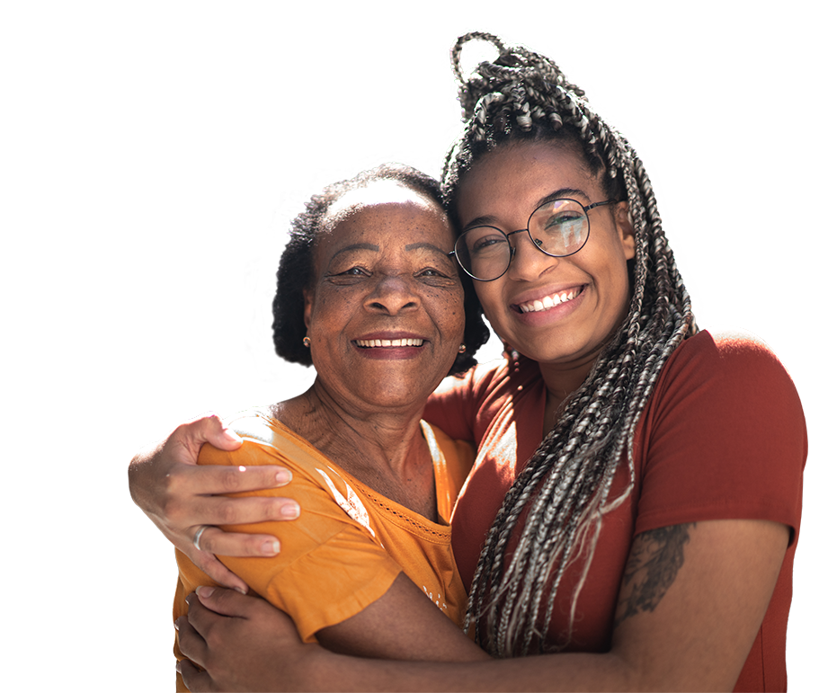 smiling-older-younger-woment Older and Younger Women Smiling and Hugging